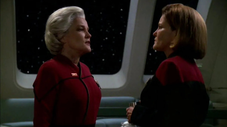 Captain Janeway confronts her future self in the ready room in Star Trek: Voyager