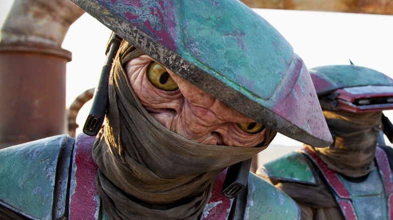 Constable Zuvio glaring downward in 