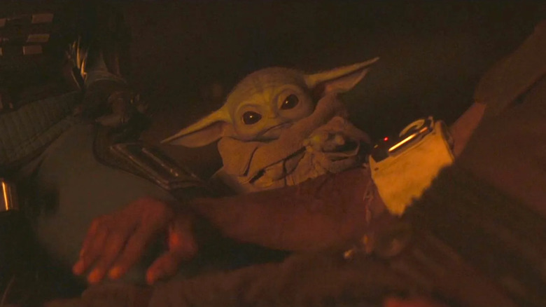 Grogu using Force healing on Greef Karge on "The Mandalorian"