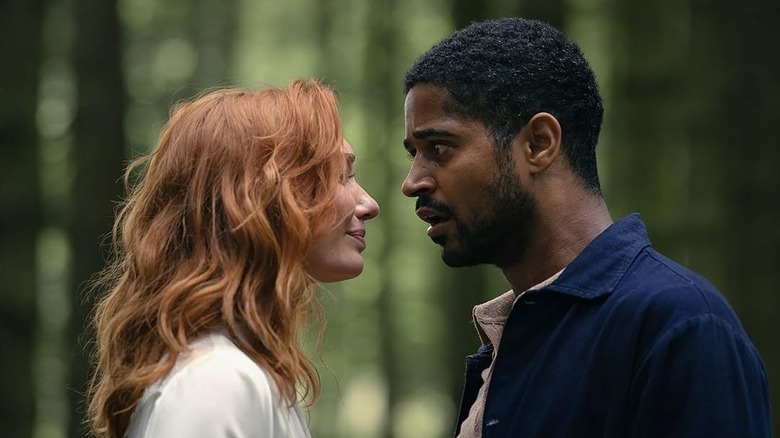 Evie and Pete in the woods in The Couple Next Door