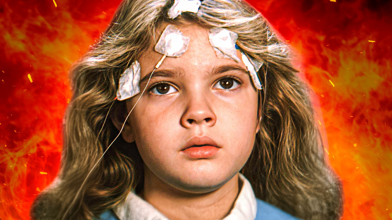 Charlie from Firestarter surrounded by flames