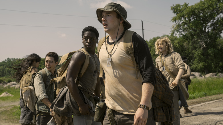 Parker, Harkness, McVries, Garraty, Barkovitch walking in 