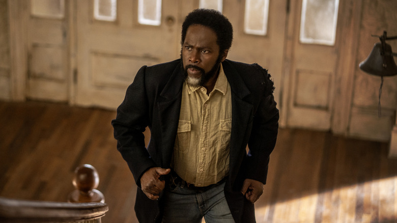 Boyd Stevens walking up a staircase on "From" (2022-present)
