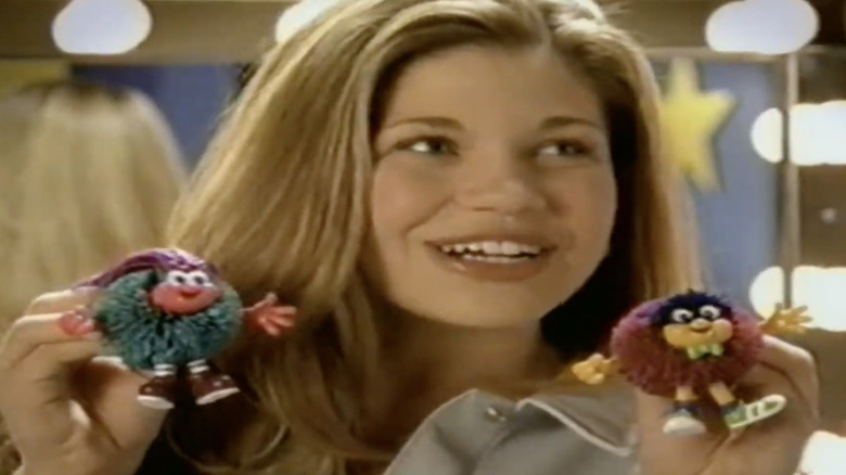 Danielle Fishel holds up Koosh Lings