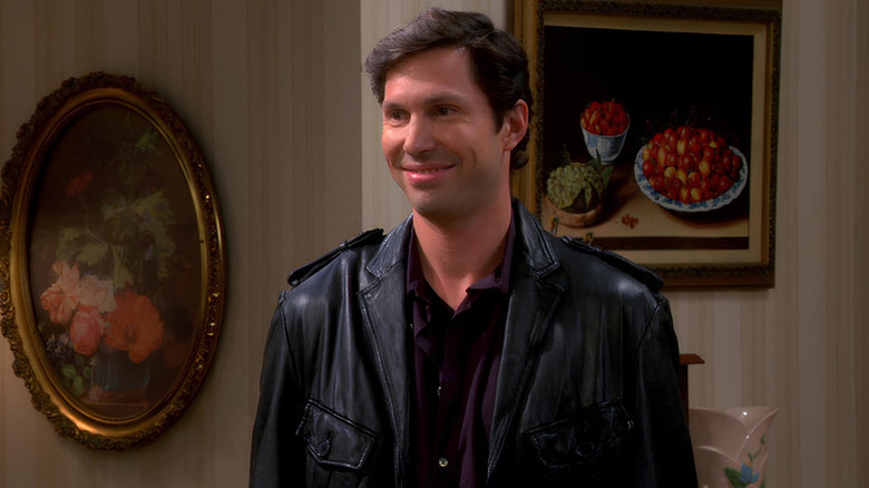 Zack smiling in the living room on The Big Bang Theory