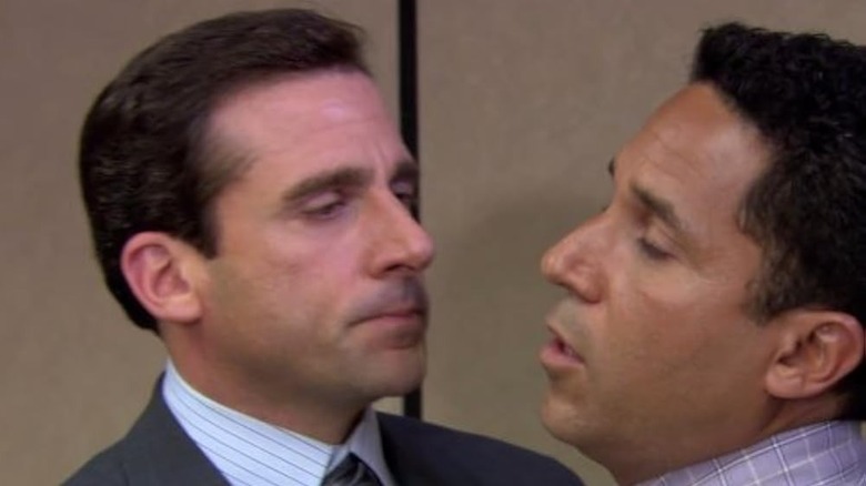 Michael trying to kiss Oscar on The Office