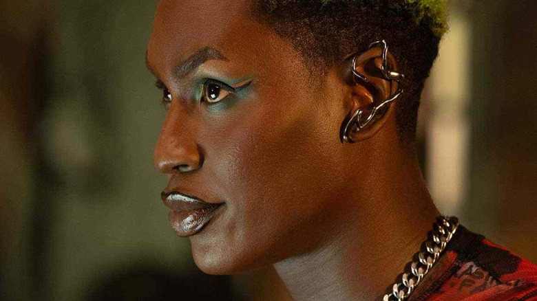 Slug at their computer in "Ironheart" (2025)