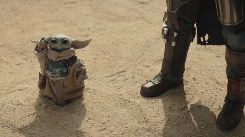 Grogu pointing up in The Mandalorian and Grogu