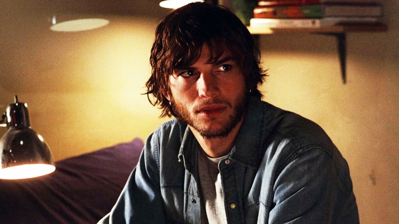 Evan Treborn sitting on his bed in 'The Butterfly Effect'