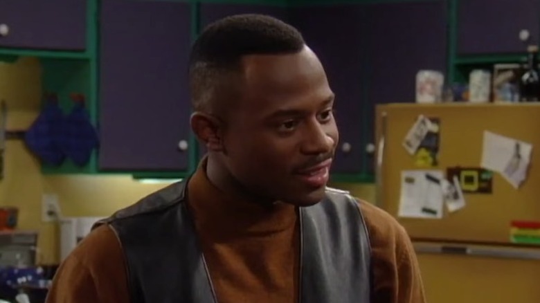 Martin Payne standing with a half-grin on "Martin" (1992-1997)