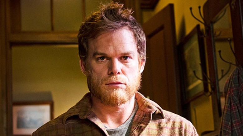Dexter with a beard, frowning, in "Dexter."