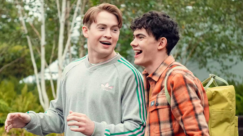 Charlie and Nick laughing together in "Heartstopper"