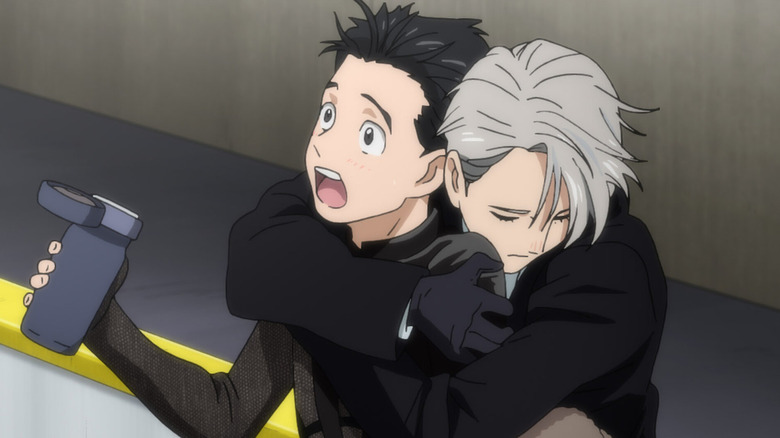 Yuri is hugged from behind by Victor in "Yuri On Ice"
