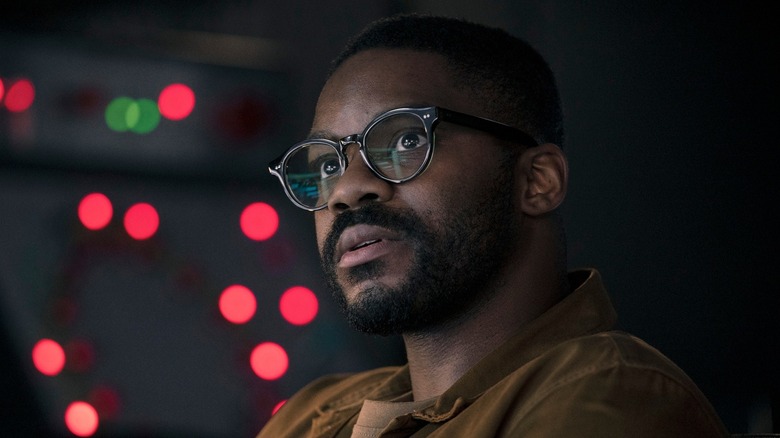 Dr. Saul Durand looking at a screen in 3 Body Problem