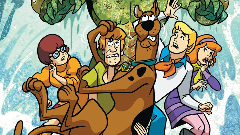 Mystery Inc. running away from a monster in Scooby-Doo! Mystery Inc.
