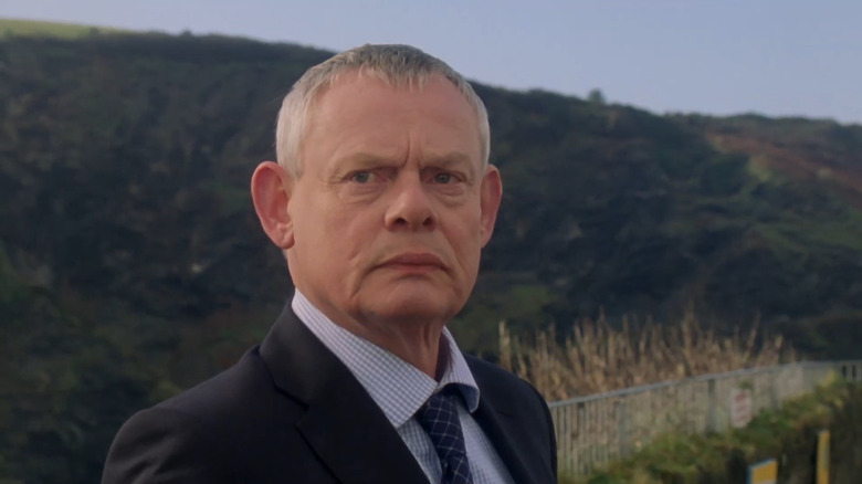 Dr. Martin looking over his shoulder on Doc Martin