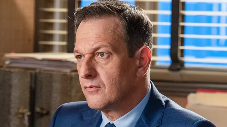 Dr. Martin Best looking serious in a blue suit on Best Medicine