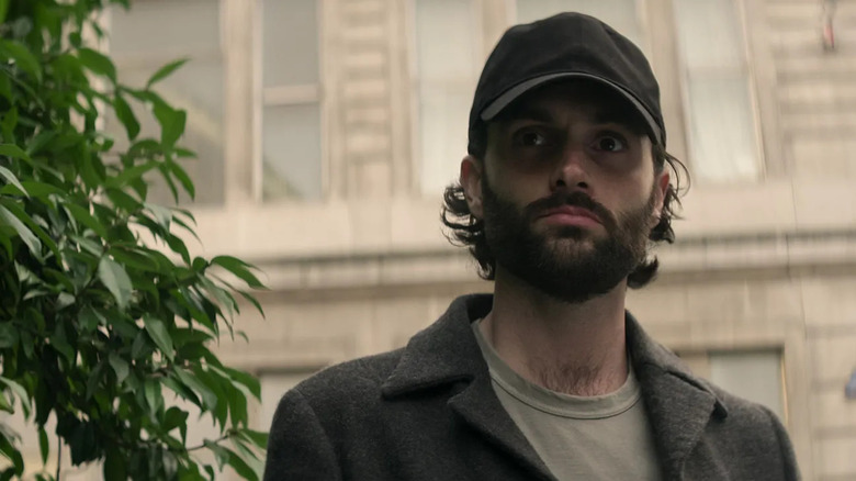 Joe in his murder baseball cap in You