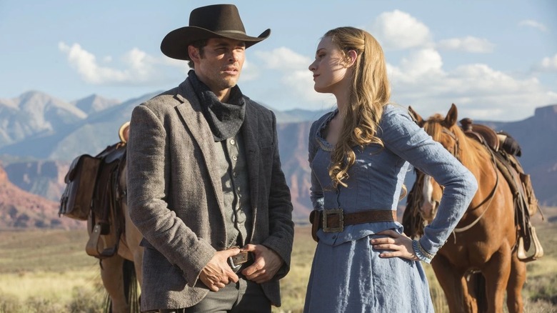 Teddy and Dolores with some horses in Westworld (2016-2022)