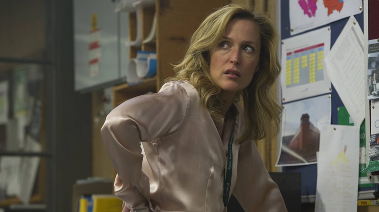 Stella looking behind her annoyed in The Fall