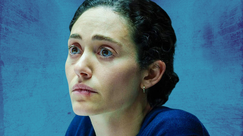 Alice on Furious looking concerned with a blue backgroud
