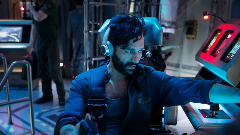 Alex steering the ship in The Expanse