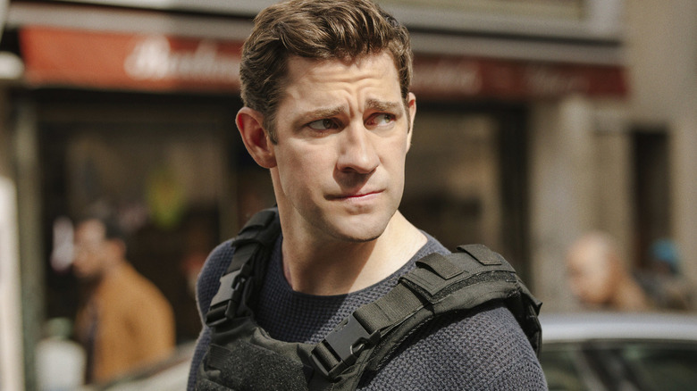 Jack Ryan looking alert and wearing a vest on Jack Ryan