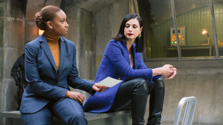 Val showing Federova a piece of paper in The Endgame (2022)