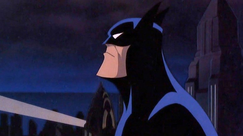 Batman looks out over the night sky in "Batman: The Animated Series" (1992-1995)