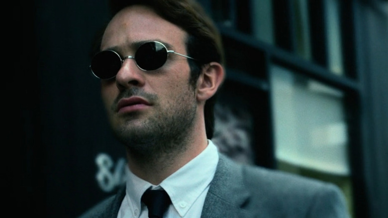 Matt walking outside in his sunglasses in "Daredevil" (2015-present)