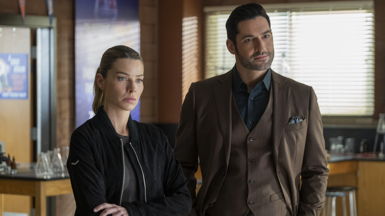 Chloe Decker and Lucifer standing together in a classroom