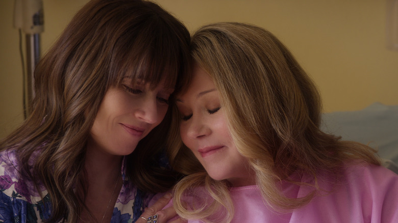 Jen Harding and Judy Hale comforting each other on Dead To Me