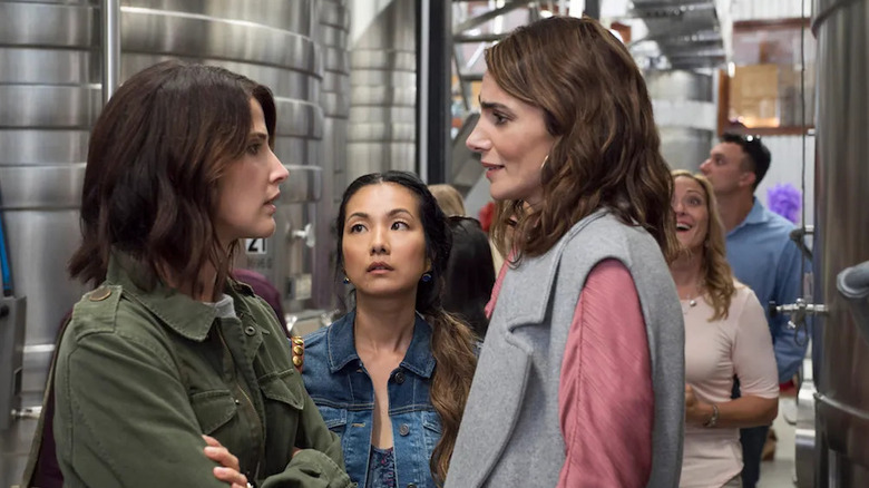 Lisa and Sam arguing with Marianne between them on Friends from College