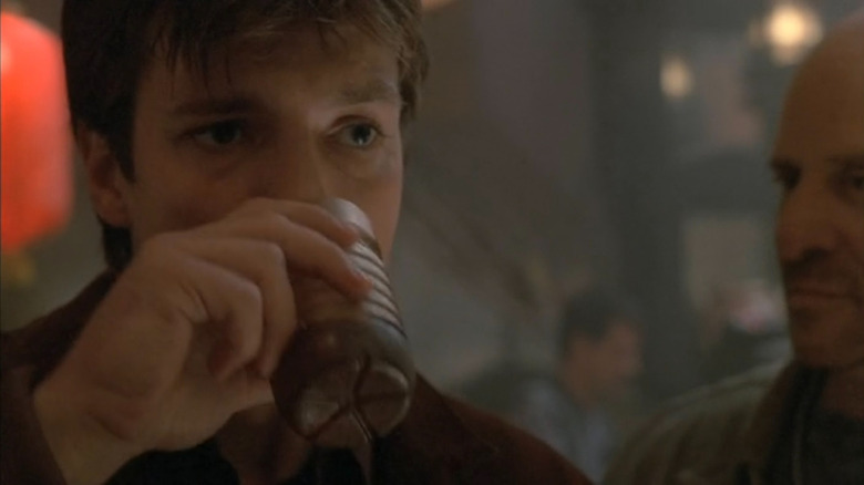 Mal Reynolds drinking on Firefly