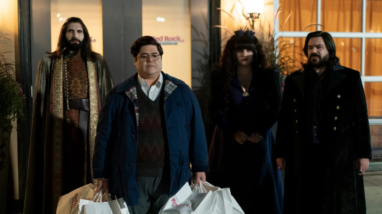 Nandor Guillermo Nadja and Laszlo standing around looking confused in What We Do in the Shadows