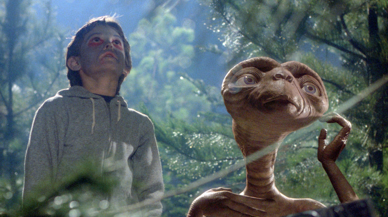 Elliot and E.T. looking up to the sky in E.T. the Extra-Terrestrial (1982)
