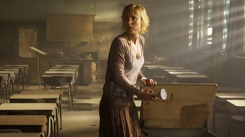 Rose Da Silva inspecting a creepy classroom in "Silent Hill"