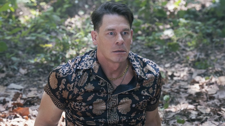 Chris Smith sitting outside in the leaves in Peacemaker (2025)