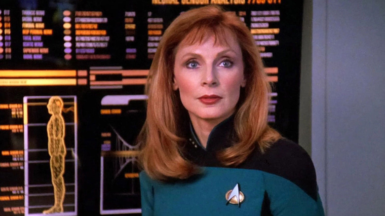 Dr. Crusher in front of a display in "Star Trek: The Next Generation"