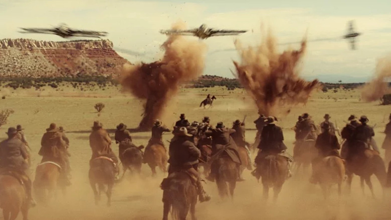 A band of outlaws attack alien spaceships in Cowboys & Aliens (2011)