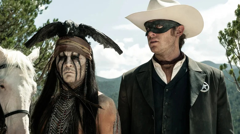 Tonto and the Lone Ranger beside Silver in The Lone Ranger (2013)