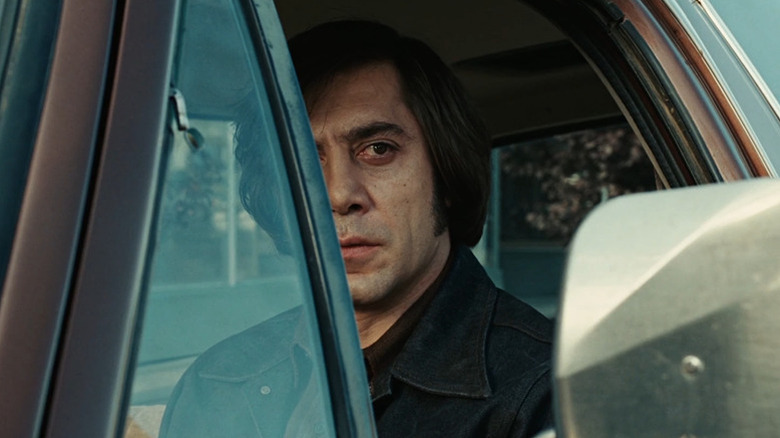 Anton (Javier Bardem) sitting in a car in "No Country for Old Men."