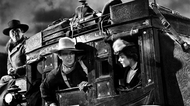 Three of the Stagecoach leads looking around for danger (1939)