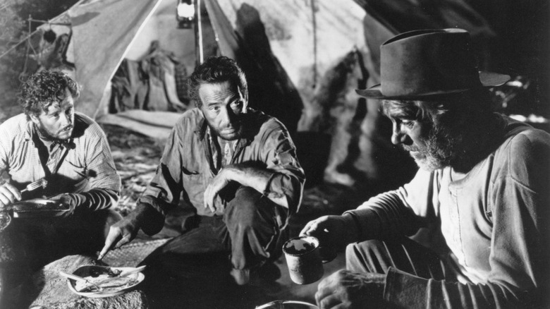 The three leads of The Treasure of the Sierra Madre starting to look desperate (1948)