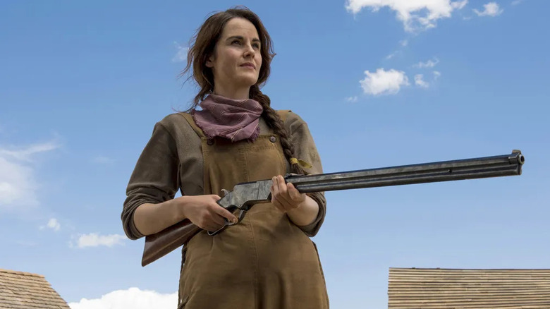 Alice Fletcher smirks with a gun in "Godless"
