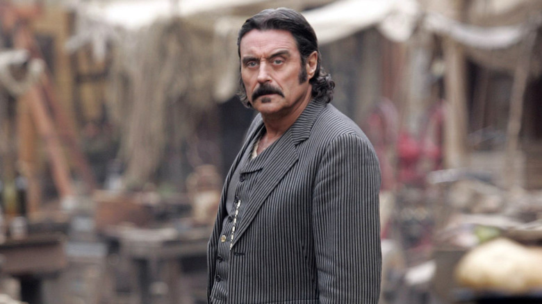 Al Swearengen stares into the distance in "Deadwood"