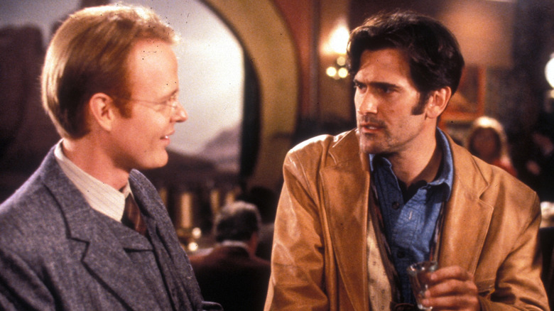 Socrates Poole and Brisco County Jr. talk over shots in "The Adventures of Brisco County Jr.