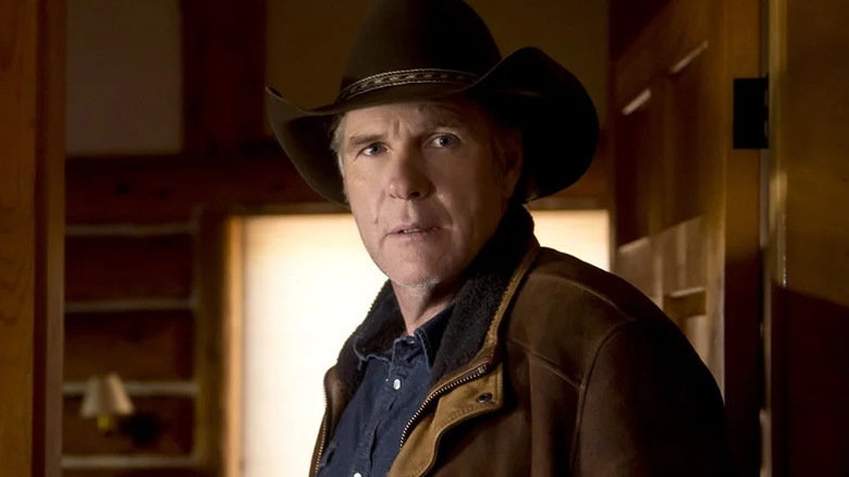 Sheriff Walt Longmire looks at a crime scene on "Longmire" (2012-2017)