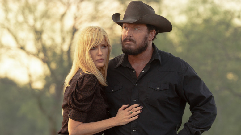 Beth nestles against Rip while outdoors on "Dutton Ranch" (2026)