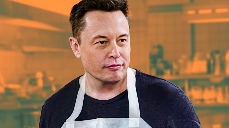 Elon Musk on The Big Bang Theorty in front of an orange tinted kitchen background